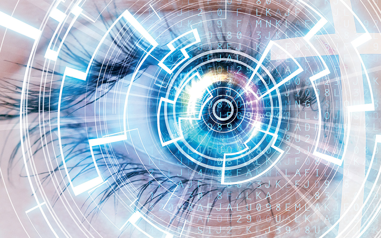 Woman's eye overlaid with tech graphics