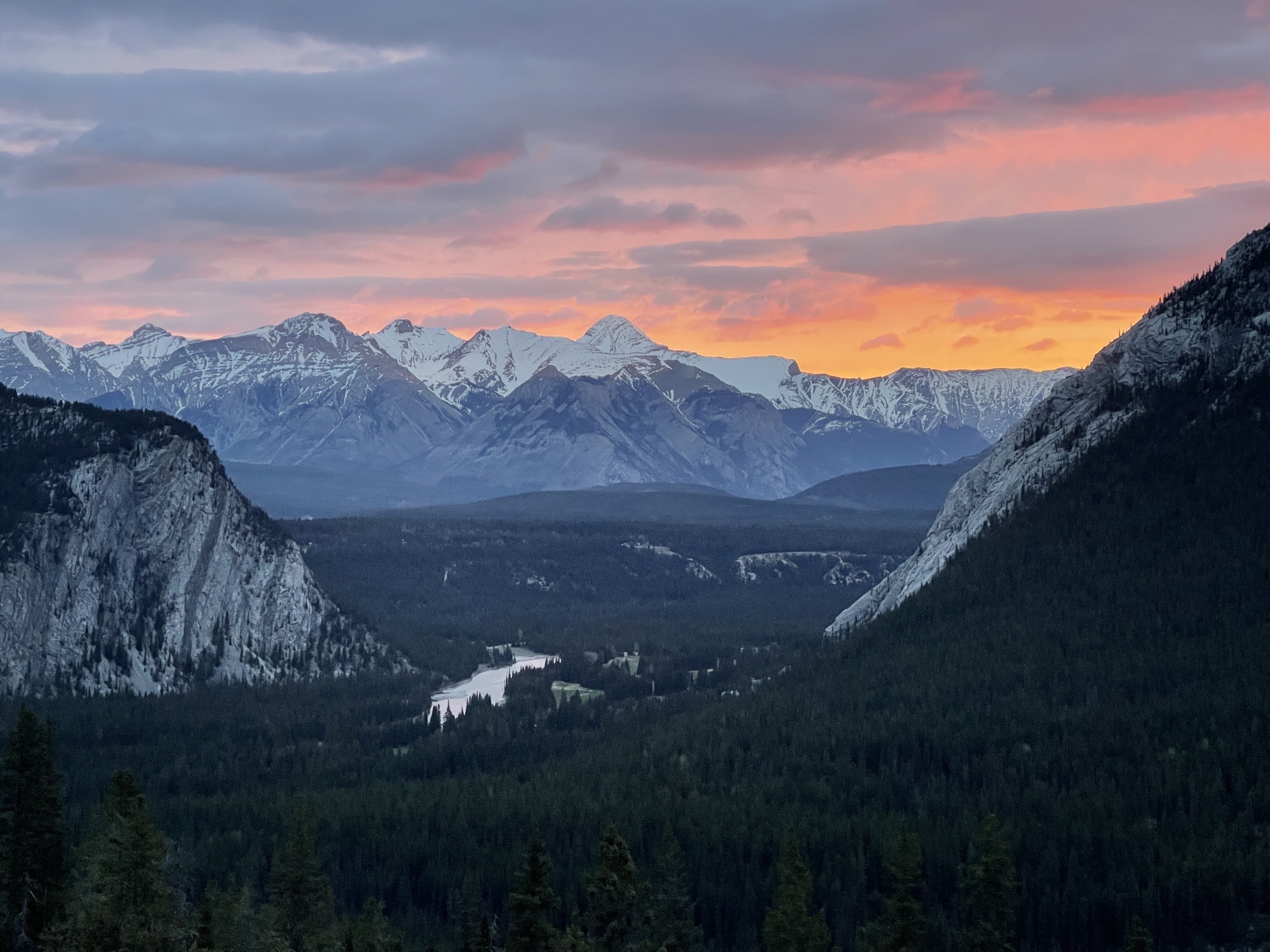 Photo of the Rocky Mountains in Banff, Alberta, Canada, at sunrise on May 18, 2022, at 5:38 am using an iPhone 14 Pro Max